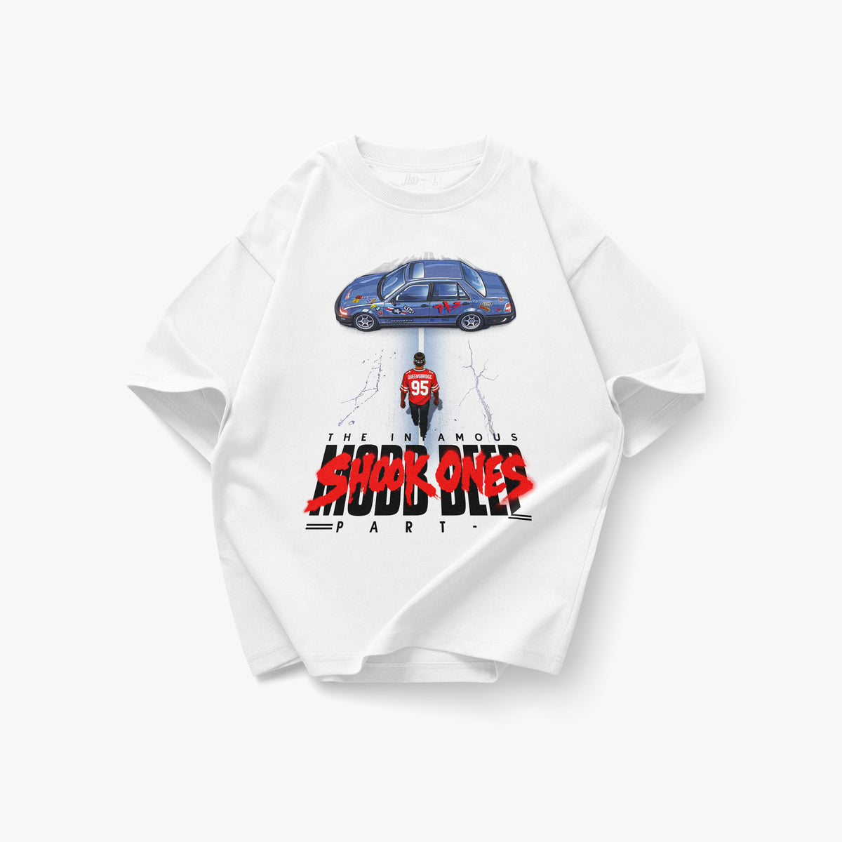 Oversized white heavyweight T-shirt featuring a large front graphic inspired by Mobb Deep and Akira. The artwork shows a lone figure in a red jersey walking toward a blue modified car from an overhead perspective, referencing iconic anime and hip-hop imagery. Bold distressed typography reads “The Infamous Shook Ones Part,” with FKONYC branding incorporated into the design. Product shown on a clean white background.